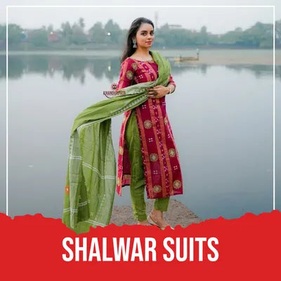 Woman wearing a maroon and green shalwar kameez with a lake in the background, labeled 'Shalwar Suits'.