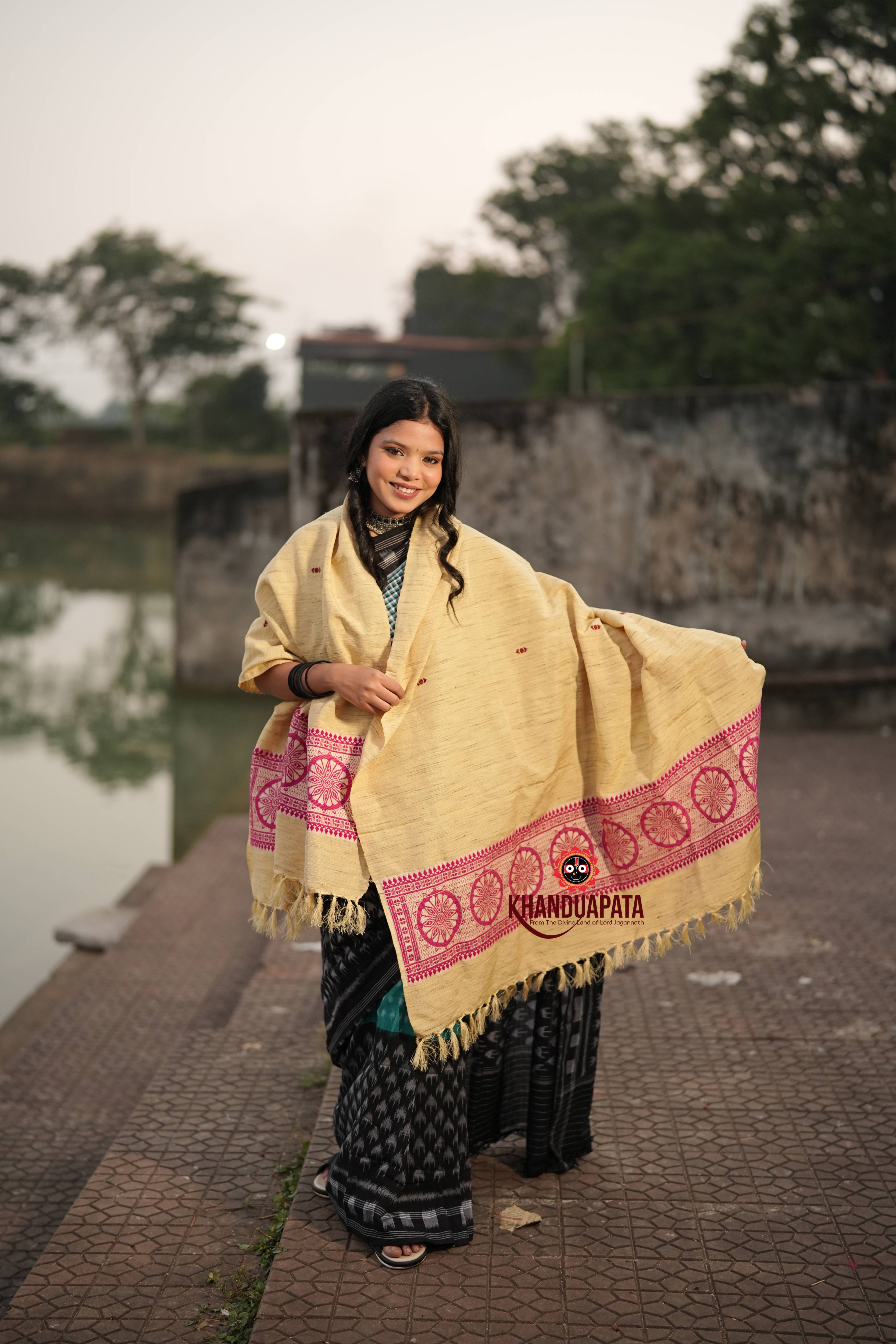 Model wearing Beige handloom Shawl with traditional patterns